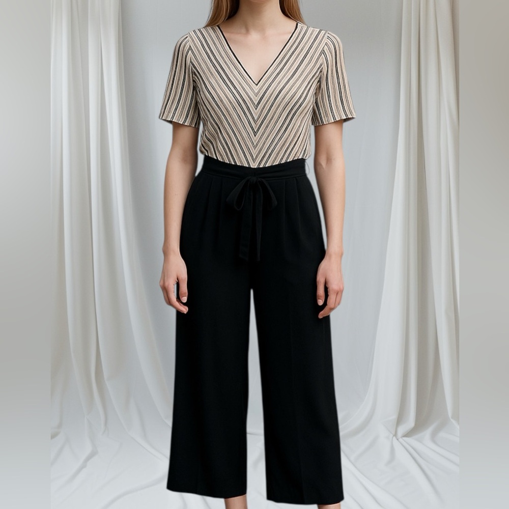 Open back jumpsuit size Medium with a matching belt and pockets, NWOT